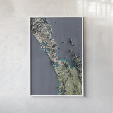 The image is a framed aerial view of a coastal area, depicting a mix of land and water features.