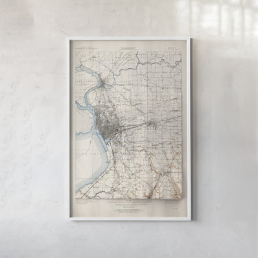 The image is a framed map of a region, likely a historical or geographical map, displayed on a wall.
