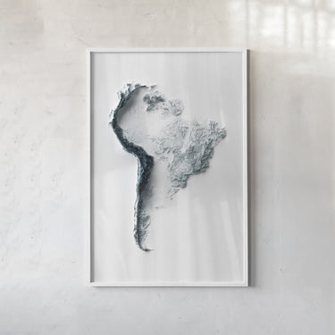 The image is a framed artwork depicting a stylized representation of a landscape or geographical feature, possibly a mountain range or a coastline, in a minimalist and abstract style.