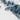 The image is a close-up view of a rocky, mountainous terrain with a predominantly gray and white color palette. The terrain appears rugged and uneven, with a mix of jagged peaks and valleys. The image does not contain any text or other discernible objects or actions.