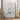 a roll of paper with a drawing of a map and a tube of paper, along with text promoting fine art prints made in the USA.