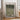 a roll of paper with a printed image of a landscape, along with a tube of paper and a website address for fine art prints.