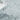The image is a detailed 3D rendering of a mountainous terrain, with a textured and rugged appearance.