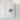 a white frame containing a single, abstract, and minimalist piece of art, which appears to be a representation of a flower or plant.