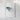 The image is a framed artwork hanging on a white wall.
