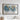a large, framed world map hanging on a wall, depicting the continents and oceans in a detailed and colorful manner.