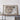 a large, detailed map of Spain and Portugal displayed on a wooden shelf.