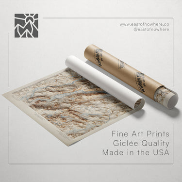 a map printed on paper and a roll of paper with a map printed on it, both placed on a white background.