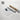 a roll of paper with a printed artwork on it, along with a tube of paper and a website address for fine art prints.