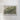 The image is a framed map of a mountainous region, depicting the terrain with various shades of green and brown.