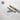 a roll of paper with a printed image of a mountain range on it, along with a tube of paper and a text box containing the text "Fine Art Prints Giclette Quality Made in the USA".