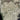 The image is a satellite view of a densely populated area, showing a grid-like pattern of roads, buildings, and other urban features.