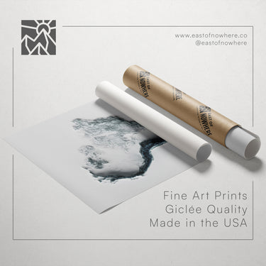 a roll of paper with a printed image of a mountain landscape, along with text promoting fine art prints and their quality.