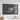 a large, framed map of the island of Cyprus hanging on a wall.