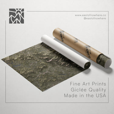 a roll of paper with a landscape print on it, along with a tube of paper and a text overlay promoting fine art prints made in the USA.