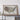 a large framed map of the United States, mounted on a wall above a wooden table.