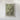 The image is a framed map of a mountainous region, depicting the terrain and landscape in a detailed and realistic manner.