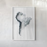 The image is a framed artwork depicting a stylized representation of a landscape or geographical feature, possibly a mountain range or a coastline, in a minimalist and abstract style.