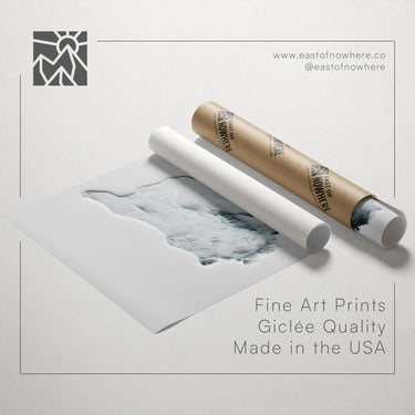 a roll of paper with a printed image of a polar bear on it, along with text promoting fine art prints made in the USA.