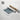 a roll of paper with a printed image of a blue and white ocean scene, along with text promoting fine art prints and their quality.
