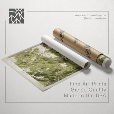 a map printed on paper and a tube of paper with a map printed on it, both placed on a white background.
