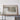 a large framed map of Oklahoma, with a wooden shelf below it.