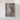 The image is a framed aerial photograph of a rocky, mountainous landscape.