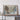 a large framed map of the United States, with a wooden shelf below it.