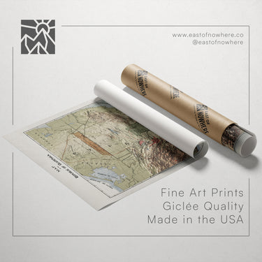 a map of the United States, along with a roll of paper and a tube of paper, all placed on a white background.
