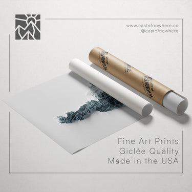a roll of paper with a printed image of a mountain range, along with text promoting fine art prints and their quality.