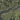 The image is a satellite view of a large body of water, likely a lake or a river, surrounded by mountains and hills. The water appears to be a dark blue color, indicating it could be a lake or a river with a significant depth. The surrounding landscape is rugged and uneven, with various shades of green and brown visible. The image does not contain any text or specific details about the location or the surrounding area.