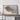 a framed road map of Santa Cruz County, California, with a wooden shelf below it.