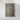 The image is a framed aerial view of a mountainous region, showcasing the rugged terrain and natural landscape.