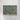 The image is a framed aerial view of a large, green landmass with a coastline visible.