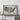 a large framed map of the United States, mounted on a wall above a wooden table.