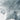 The image is a close-up of a textured surface, possibly a piece of paper or a fabric, with a gray and white color scheme. The surface appears to be crumpled or wrinkled, giving it a somewhat rough or aged appearance.