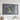 a large, framed map of Hawaii hanging on a wall.