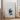 a roll of paper with a drawing of a landscape, along with text promoting fine art prints made in the USA.