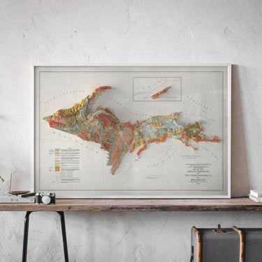 a map of the United States, along with a roll of paper and a tube of paper, all placed on a white background.