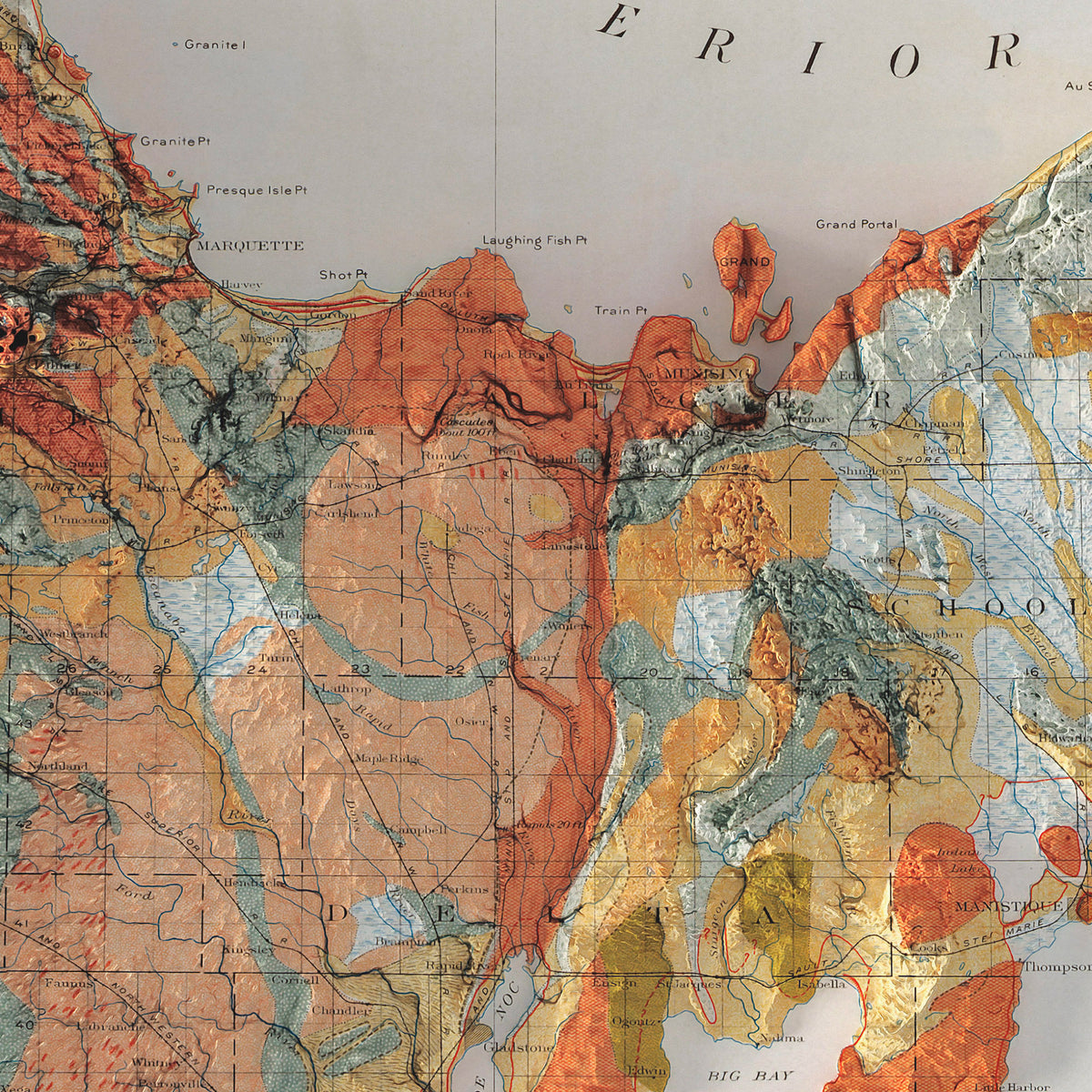 a large framed map of the United States, specifically the state of Michigan, displayed on a wooden shelf.