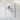 The image is a framed artwork hanging on a white wall.