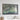 a large, framed artwork depicting a vibrant, abstract landscape with a mix of green, blue, and brown colors.