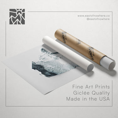 a roll of paper with a printed image on it, along with a tube of paper and a text box containing text.