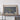 a large framed map of the Pacific Ocean, with a vintage-style frame and a wooden shelf below it.