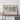 a large world map with a detailed geological structure, displayed on a wooden shelf or table.