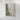 The image is a framed map of a mountainous region, with a detailed and intricate depiction of the landscape.