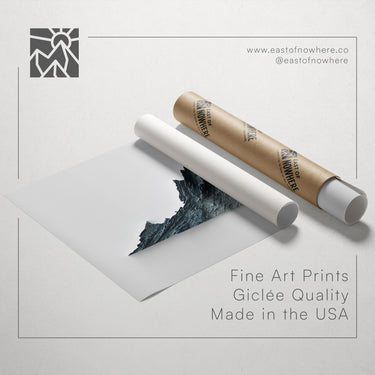 a roll of paper with a printed image of a mountain landscape, along with text promoting fine art prints made in the USA.