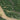 The image is an aerial view of a lush, green landscape with winding rivers and streams.