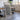 a large framed map of Yosemite National Park, with a wooden table and chairs in the background.