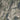 The image is a satellite view of a densely populated urban area, likely New York City, with a mix of land, water, and infrastructure visible.